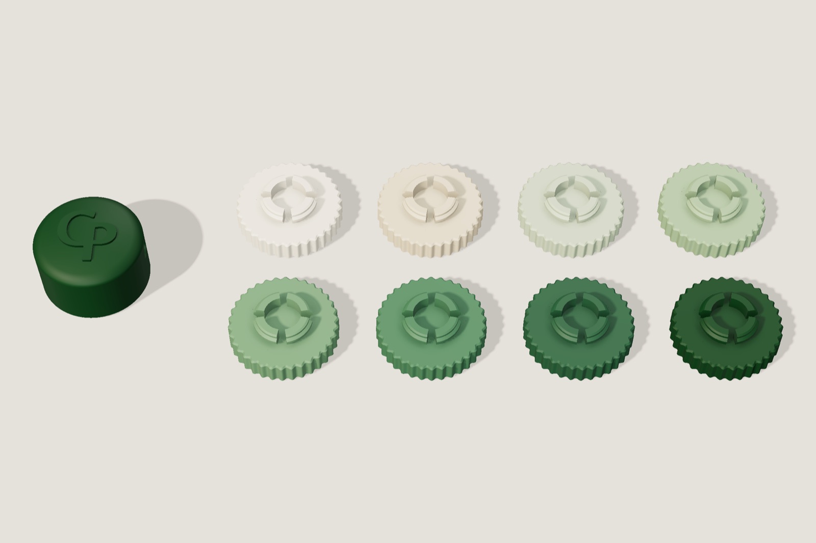 Render: the dark green cap and eight ribbed rings laid out flat, each with a keyed hole in the centre