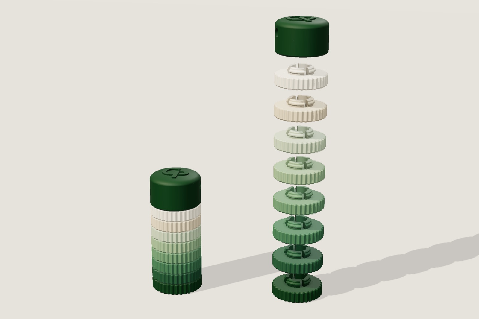 Render: a stacked cylinder of ribbed rings from cream to green under a dark green cap, next to the same stack pulled apart to show each ring
