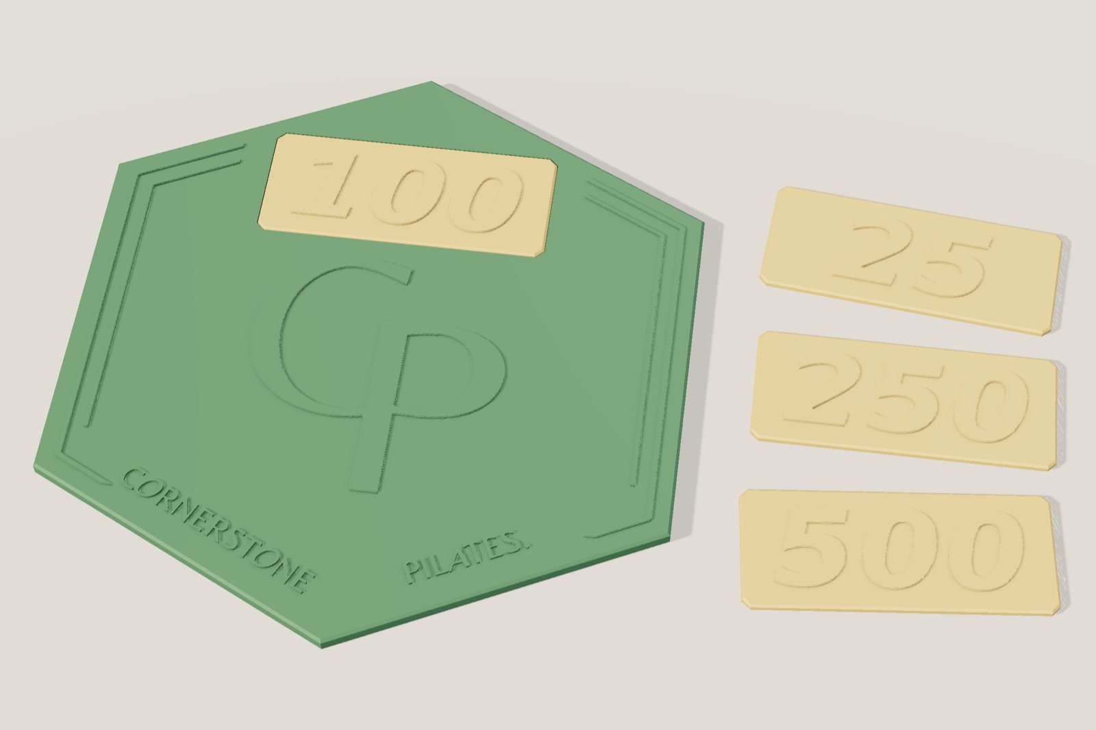 Render: the plaque with a 100 tile in place and three loose tiles reading 25, 250 and 500