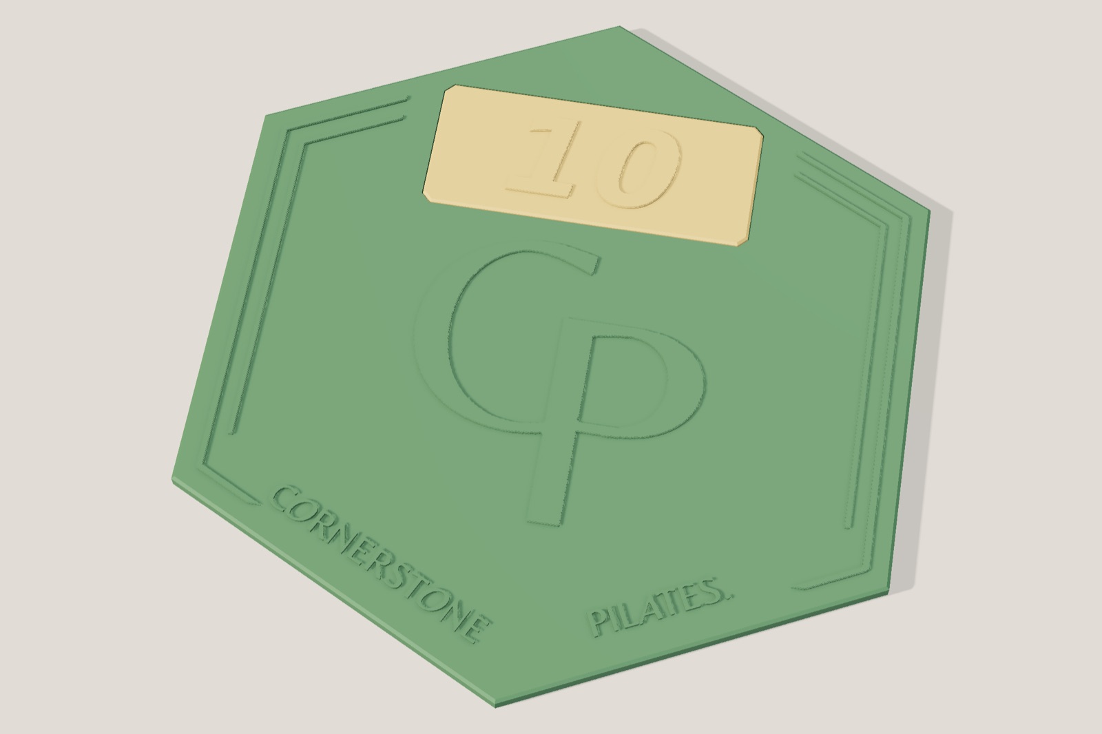 Render: a green hexagonal plaque with the CP mark, the words Cornerstone Pilates, and a cream tile reading 10 near the top